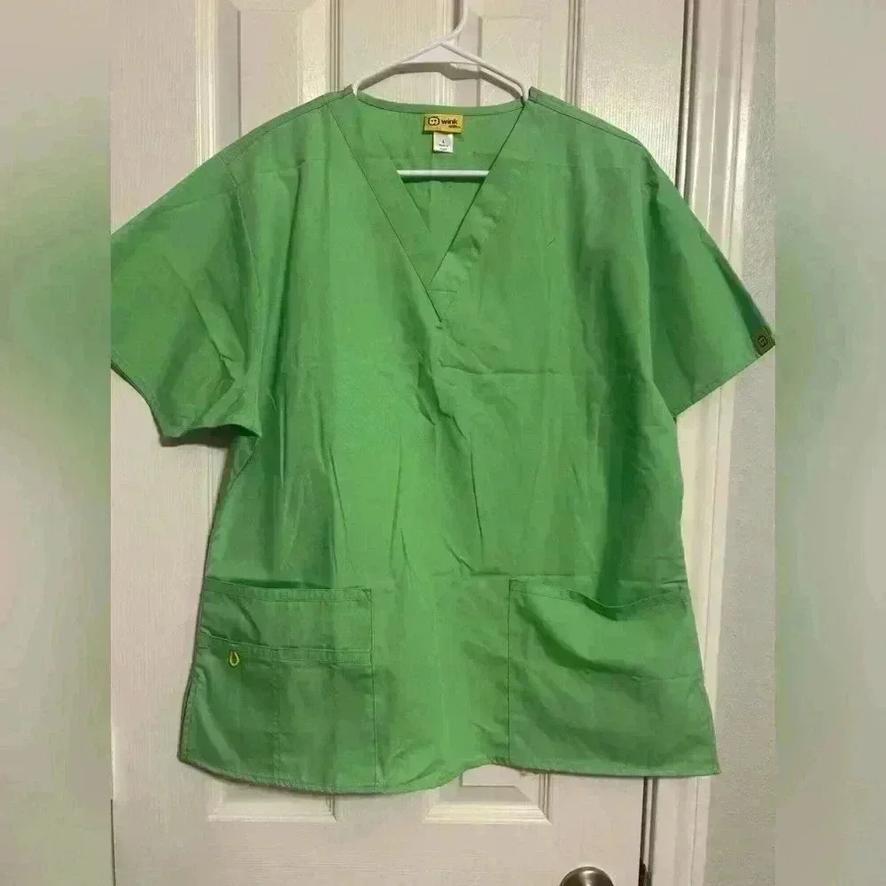 Like new- wink scrub top size large- lime green